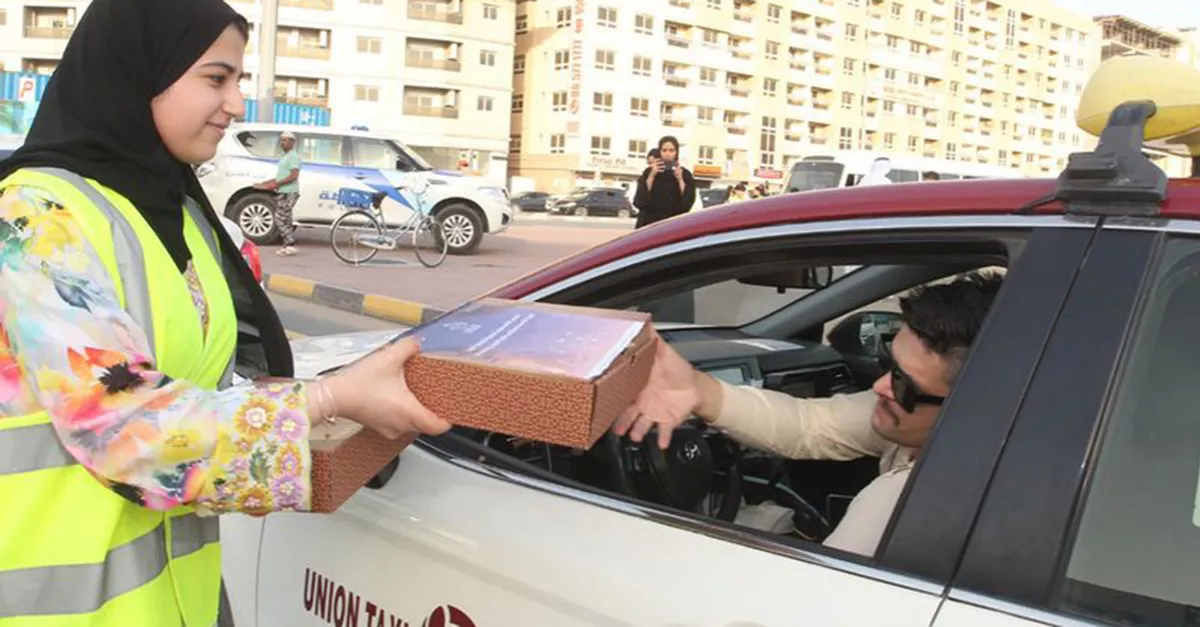 Iftar meals are being distributed to pedestrians and passersby in Sharjah city as part of “Your Iftar is Ready” event